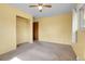 Bedroom with one window, a ceiling fan, and grey carpet at 3354 W Arlington Ave, Littleton, CO 80123