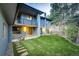 Backyard featuring a manicured lawn and a patio area perfect for outdoor entertaining at 2857 Linden Dr, Boulder, CO 80304