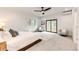 Bright bedroom featuring neutral carpet, a ceiling fan and a private patio at 2857 Linden Dr, Boulder, CO 80304