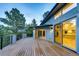 Expansive deck featuring sliding glass doors that offers indoor/outdoor living and scenic tree views at 2857 Linden Dr, Boulder, CO 80304