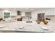 Kitchen with stainless steel appliances, large island with seating, and bright white cabinets at 2857 Linden Dr, Boulder, CO 80304