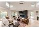 Living room features a modern fireplace, large windows, wood floors, and comfortable seating at 2857 Linden Dr, Boulder, CO 80304