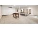 Spacious recreation room with white walls, foosball, and ping pong tables at 2857 Linden Dr, Boulder, CO 80304
