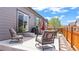 Patio featuring outdoor seating, BBQ grill and a red umbrella at 7404 Greenwater Cir, Castle Rock, CO 80108