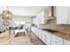 Modern kitchen boasts granite countertops, stainless steel appliances, and ample cabinet space at 7404 Greenwater Cir, Castle Rock, CO 80108