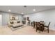 Spacious living room with a comfortable sofa, dining table, and stylish decor at 7404 Greenwater Cir, Castle Rock, CO 80108