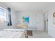 Comfortable bedroom with a bright window and neutral decor at 3425 W 111Th Loop # B, Westminster, CO 80031