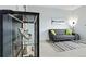 Cozy living room with a modern cabinet and a comfortable gray sofa at 3425 W 111Th Loop # B, Westminster, CO 80031