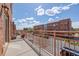 Outdoor balcony offering neighborhood views and a relaxing space at 7883 W 55Th Ave, Arvada, CO 80002