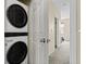 Convenient laundry area with stacked washer and dryer, maximizing space at 7883 W 55Th Ave, Arvada, CO 80002