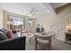 Stylish living room offering comfortable seating, ample natural light, and inviting atmosphere at 7883 W 55Th Ave, Arvada, CO 80002