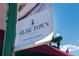 Historic Olde Town Arvada district banner with a vintage design under a clear blue sky at 7883 W 55Th Ave, Arvada, CO 80002
