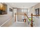 Upstairs hallway with views of the lower floor at 10305 Charissglen Cir, Highlands Ranch, CO 80126