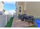 Cozy brick patio with a grill, perfect for outdoor cooking and entertaining at 5154 Bittercress Rd, Brighton, CO 80640