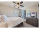 Bedroom featuring a queen bed, natural light, and dresser at 1133 S Richfield St, Aurora, CO 80017