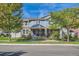 Charming two-story home with stone accents, covered porch, and well-maintained landscaping at 1133 S Richfield St, Aurora, CO 80017