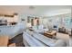 Cozy living room featuring lots of light, neutral decor, and an open layout at 1133 S Richfield St, Aurora, CO 80017