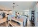 Open living space featuring kitchen, dining area, and living room at 1133 S Richfield St, Aurora, CO 80017