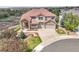 Stunning aerial view of a two-story home with a beautiful red tile roof and landscaped front yard at 23965 E Kettle Pl, Aurora, CO 80016