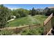 Beautiful backyard featuring a walking path and stunning green spaces at 23965 E Kettle Pl, Aurora, CO 80016