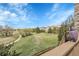 Scenic backyard view from the deck with walking path at 23965 E Kettle Pl, Aurora, CO 80016