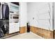 Organized walk-in closet with built-in shelving, drawers, and hanging space at 23965 E Kettle Pl, Aurora, CO 80016