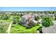 Aerial view of home, highlighting mature landscaping, elegant design, and inviting curb appeal at 23965 E Kettle Pl, Aurora, CO 80016