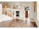 Grand foyer with hardwood floors, soaring ceilings, and a staircase leading to the upper level at 23965 E Kettle Pl, Aurora, CO 80016