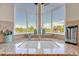 Kitchen sink with granite countertops and corner windows providing natural light and scenic views at 23965 E Kettle Pl, Aurora, CO 80016