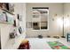 Cozy playroom with book shelves, playful decor, plush carpet, and bright natural light at 23965 E Kettle Pl, Aurora, CO 80016