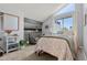 Stylish bedroom features lots of natural light, a cozy bed and modern decor at 4070 S Atchison Way # 304, Aurora, CO 80014
