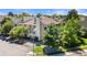 Exterior view of a residential building with well-manicured landscaping and ample parking at 4070 S Atchison Way # 304, Aurora, CO 80014