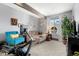 Comfortable living room with a couch and large window providing natural light at 4070 S Atchison Way # 304, Aurora, CO 80014
