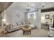 Finished basement lounge with brick wall, sofa, desk, and overhead lighting at 5161 S Emporia Way, Greenwood Village, CO 80111