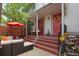Charming patio with outdoor seating, water feature, and lush plants, perfect for relaxing at 5161 S Emporia Way, Greenwood Village, CO 80111