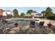 Community swimming pool surrounded by lounge chairs and well-maintained landscaping at 5161 S Emporia Way, Greenwood Village, CO 80111