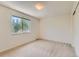 Bedroom with neutral carpet and a window letting in natural light at 11034 W Aqueduct Ln, Littleton, CO 80127