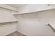 Walk-in closet with carpet and white shelving at 11034 W Aqueduct Ln, Littleton, CO 80127