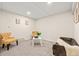Versatile flex room with neutral carpet and furniture, perfect for a home office or den at 16543 E Kansas Pl, Aurora, CO 80017
