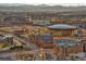 Expansive city skyline at dusk featuring stadiums, arenas, and illuminated buildings at 1020 15Th St # 20F, Denver, CO 80202