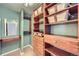 Walk in closet with built in wooden shelving at 1020 15Th St # 20F, Denver, CO 80202