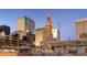 View of Denver's skyline featuring historic buildings and modern architecture against a blue sky at 1020 15Th St # 20F, Denver, CO 80202