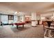 Inviting game room with a pool table, stylish seating, and large windows at 1020 15Th St # 20F, Denver, CO 80202