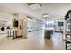 Functional laundry room features multiple washing machines, folding tables, and ample natural light for residents' convenience at 1020 15Th St # 20F, Denver, CO 80202