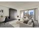 Inviting living room with floor-to-ceiling windows and city views at 1020 15Th St # 20F, Denver, CO 80202