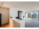 Open concept living room with city views and built in storage at 1020 15Th St # 20F, Denver, CO 80202