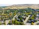 Aerial view of the community showing the home's proximity to local amenities, natural areas, and open spaces at 57 Mc Intyre Cir, Golden, CO 80401