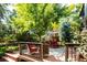 The home features a large back deck that is perfect for enjoying the outdoors with room for furniture at 57 Mc Intyre Cir, Golden, CO 80401