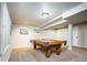 Basement featuring a pool table and neutral carpet, perfect for entertainment at 57 Mc Intyre Cir, Golden, CO 80401