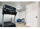 Basement room featuring treadmill, fitness equipment and carpeted floor at 57 Mc Intyre Cir, Golden, CO 80401